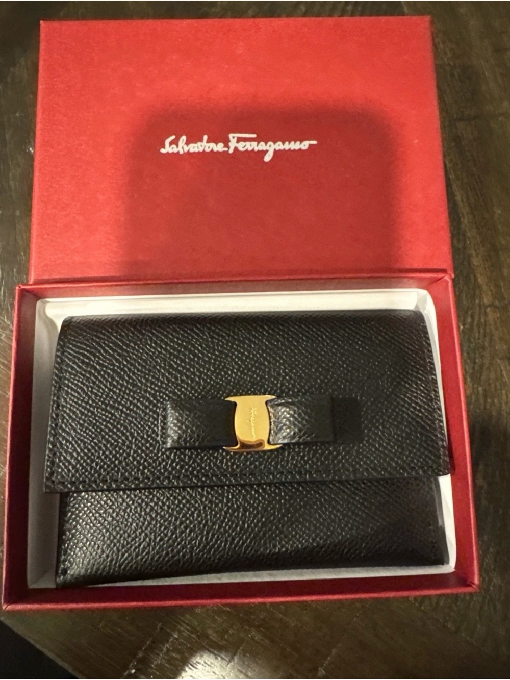 Salvatore Ferragamo Black Pebbled Leather Bow Card Holder with Gold Accent